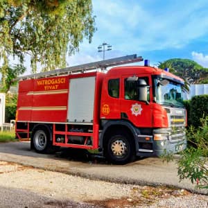 Bright red emergency fire rescue truck